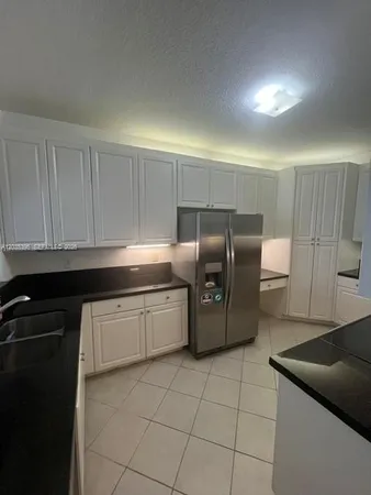 $450,000 | 10720 Northwest 66th Street, Unit 305, Doral, FL 33178