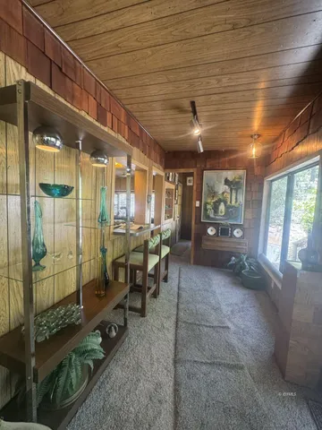 a view of a porch with furniture