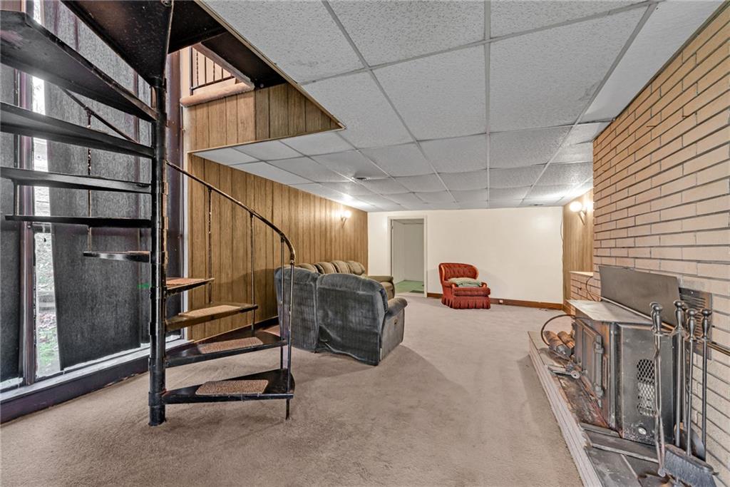 565 Upper Middletown Road Smock, PA 15480 - Photo 20 of 25 a view of a garage with furniture