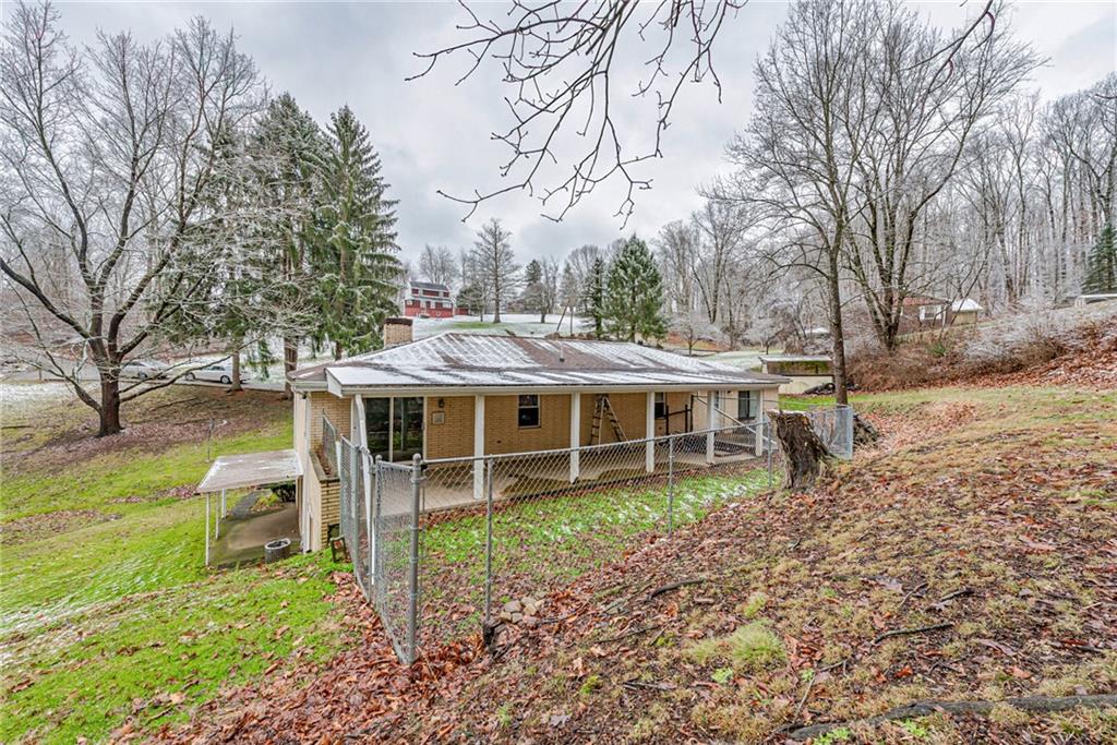 565 Upper Middletown Road Smock, PA 15480 - Photo 4 of 25 a view of a house with backyard