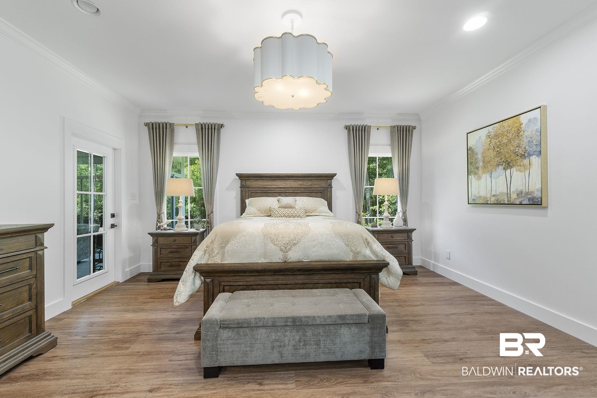 4451 Millhouse Road Gulf Shores, AL 36542 - Photo 26 of 50 Bedroom featuring light hardwood / wood-style floors, access to exterior, and ornamental molding