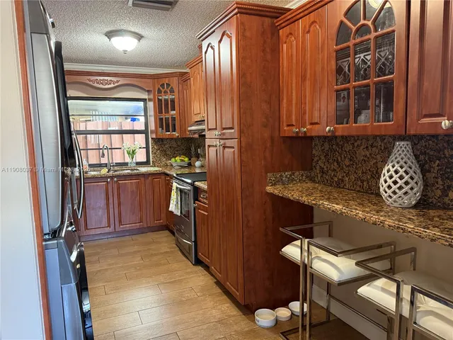 a view of balcony with furniture
