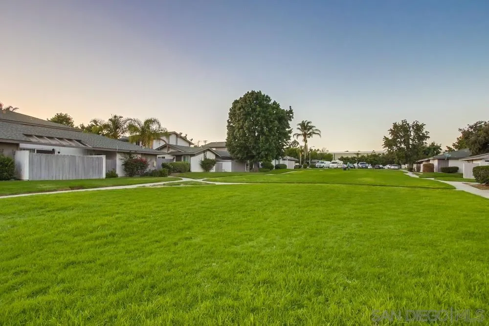 3433 Los Mochis Way Oceanside, CA 92056 - Photo 11 of 45 a view of a house with a big yard