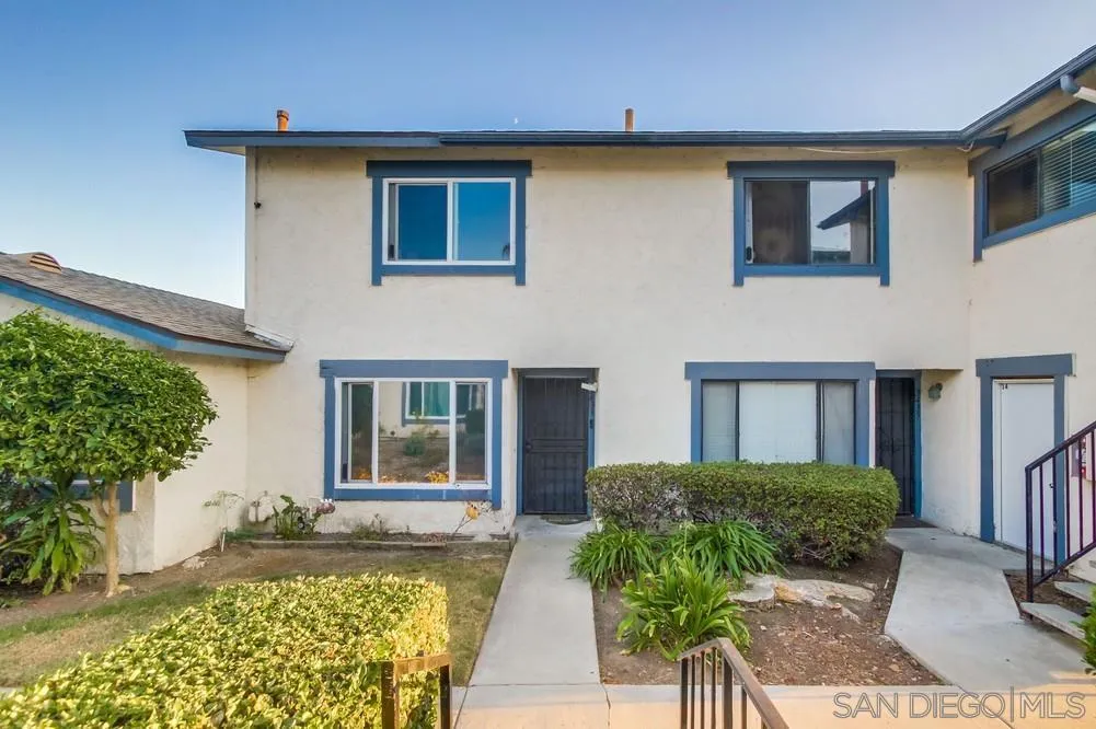 3433 Los Mochis Way Oceanside, CA 92056 - Photo 35 of 45 a front view of a house with garden