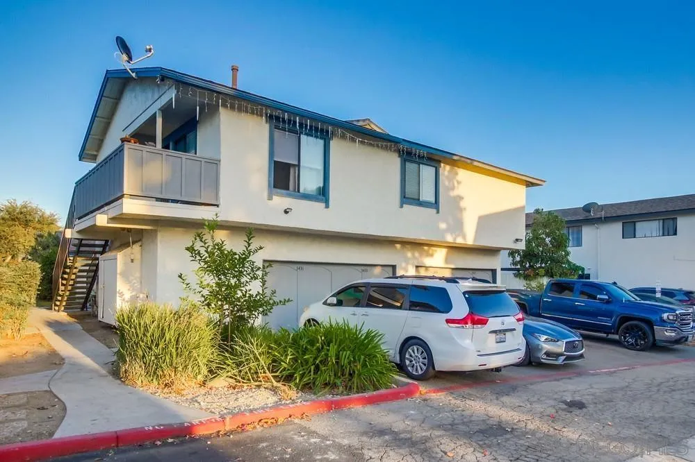 3433 Los Mochis Way Oceanside, CA 92056 - Photo 43 of 45 a car parked in front of a house