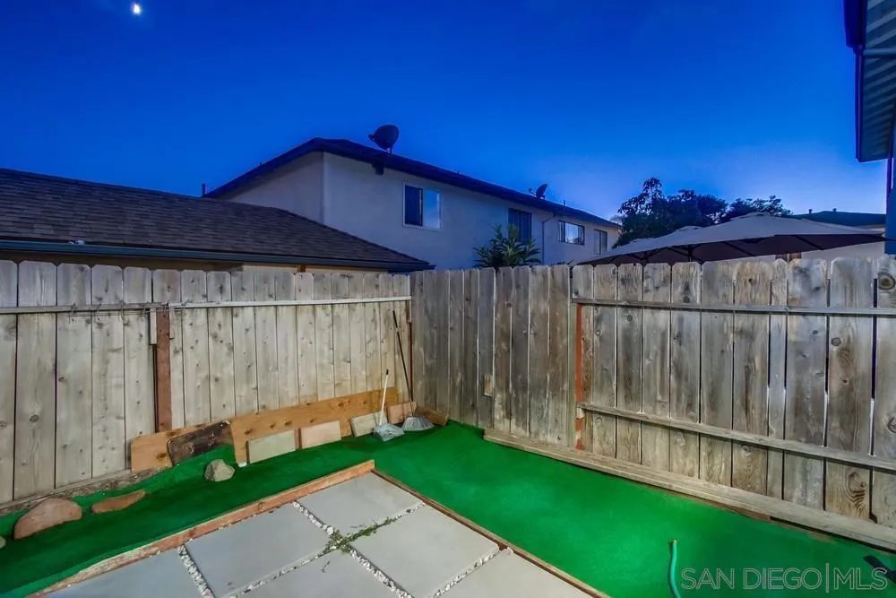 3433 Los Mochis Way Oceanside, CA 92056 - Photo 5 of 45 a view of a small barn with wooden fence