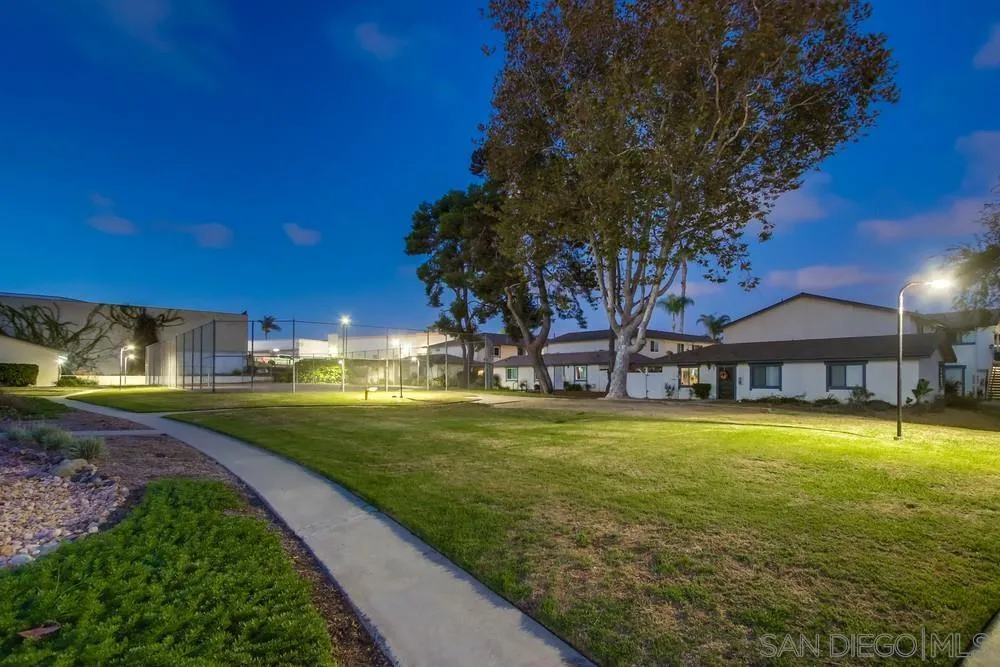 3433 Los Mochis Way Oceanside, CA 92056 - Photo 8 of 45 a view of a swimming pool with a garden