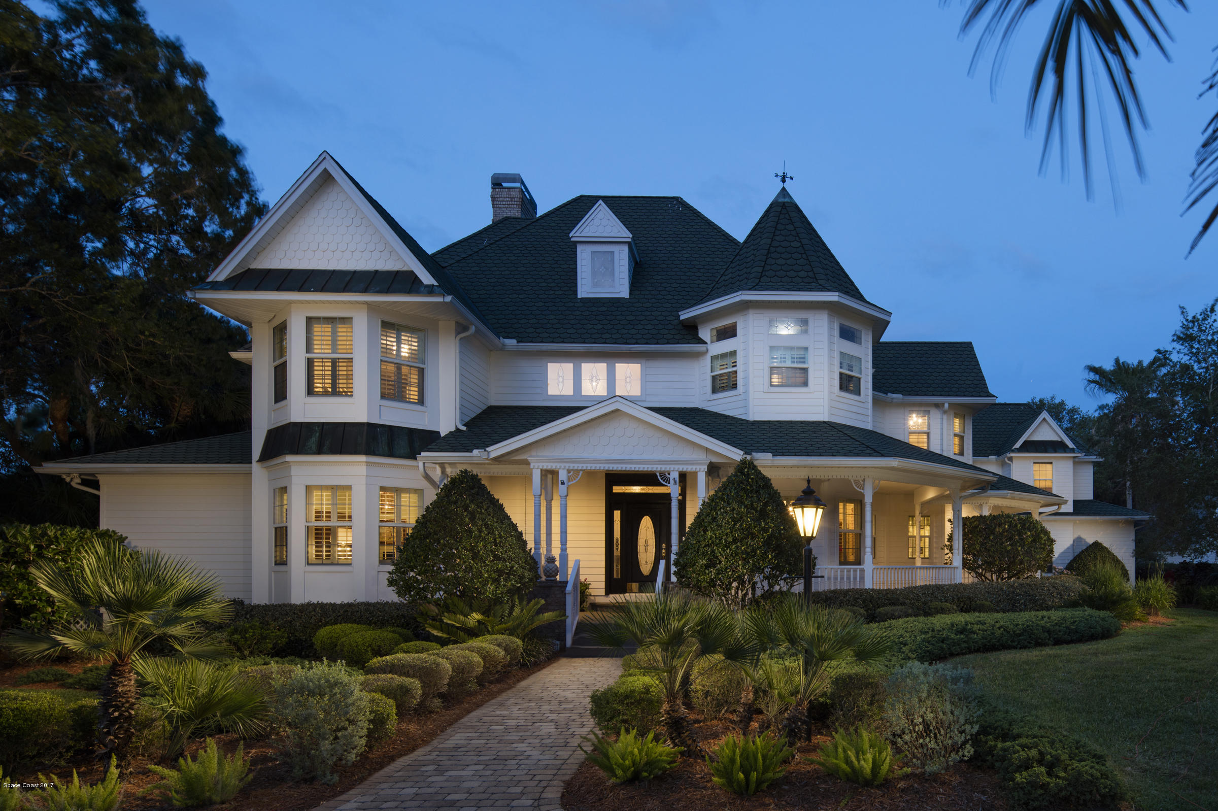 4285 Turtle Mound Road Melbourne, FL 32934 - Photo 4 of 43 Twilight- Front