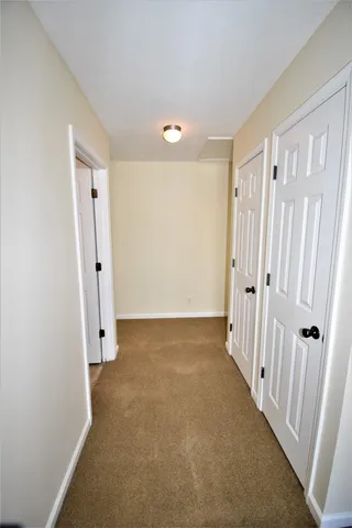 wooden floor in a hall with an entryway