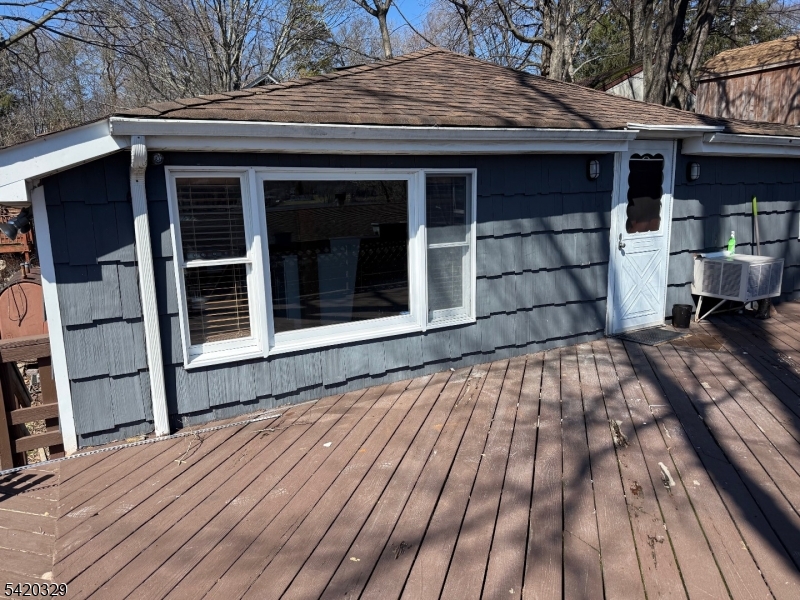 9 MacDonald Road West Milford, NJ 07421 - Photo 1 of 18 a house with wooden floor