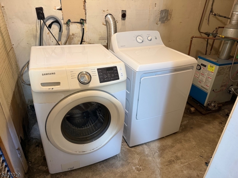 9 MacDonald Road West Milford, NJ 07421 - Photo 12 of 18 a utility room with dryer and washer