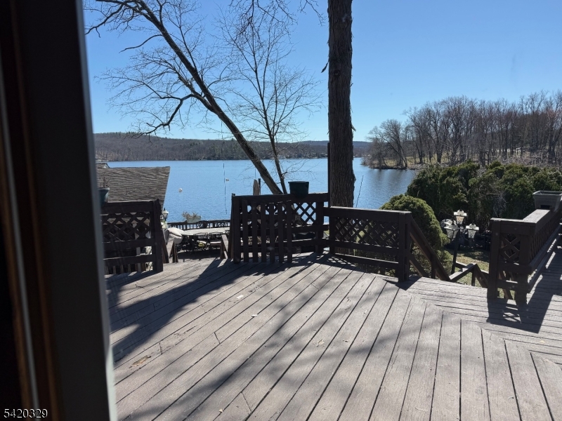 9 MacDonald Road West Milford, NJ 07421 - Photo 14 of 18 a view of balcony and deck with wooden floor