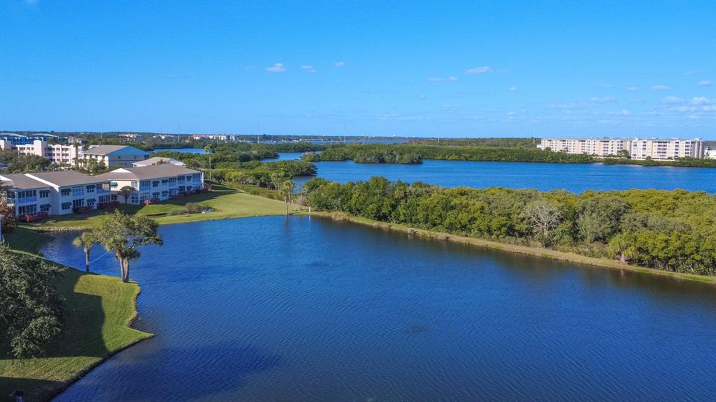 9860 62nd Avenue North, Unit 1014 St. Petersburg, FL 33708 - Photo 50 of 68 a view of a city with an ocean