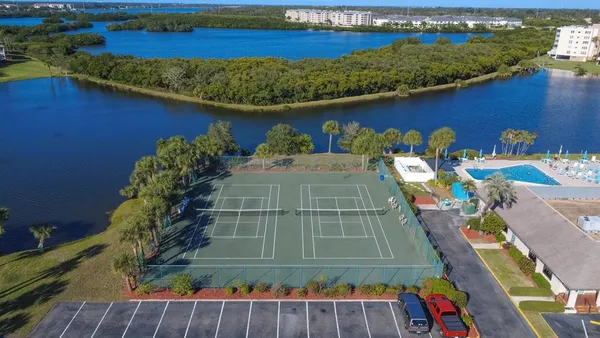 a view of house with a yard