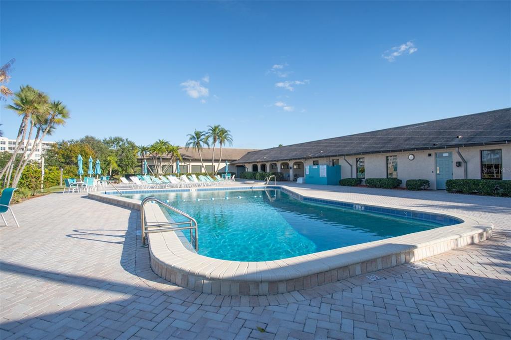 9860 62nd Avenue North, Unit 1014 St. Petersburg, FL 33708 - Photo 56 of 68 a view of swimming pool and outdoor space