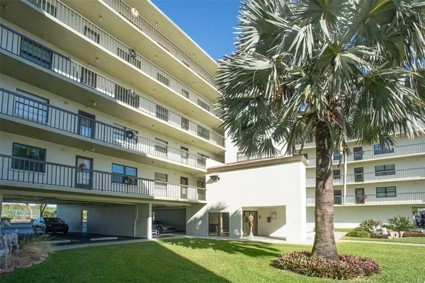 a view of a swimming pool with a porch
