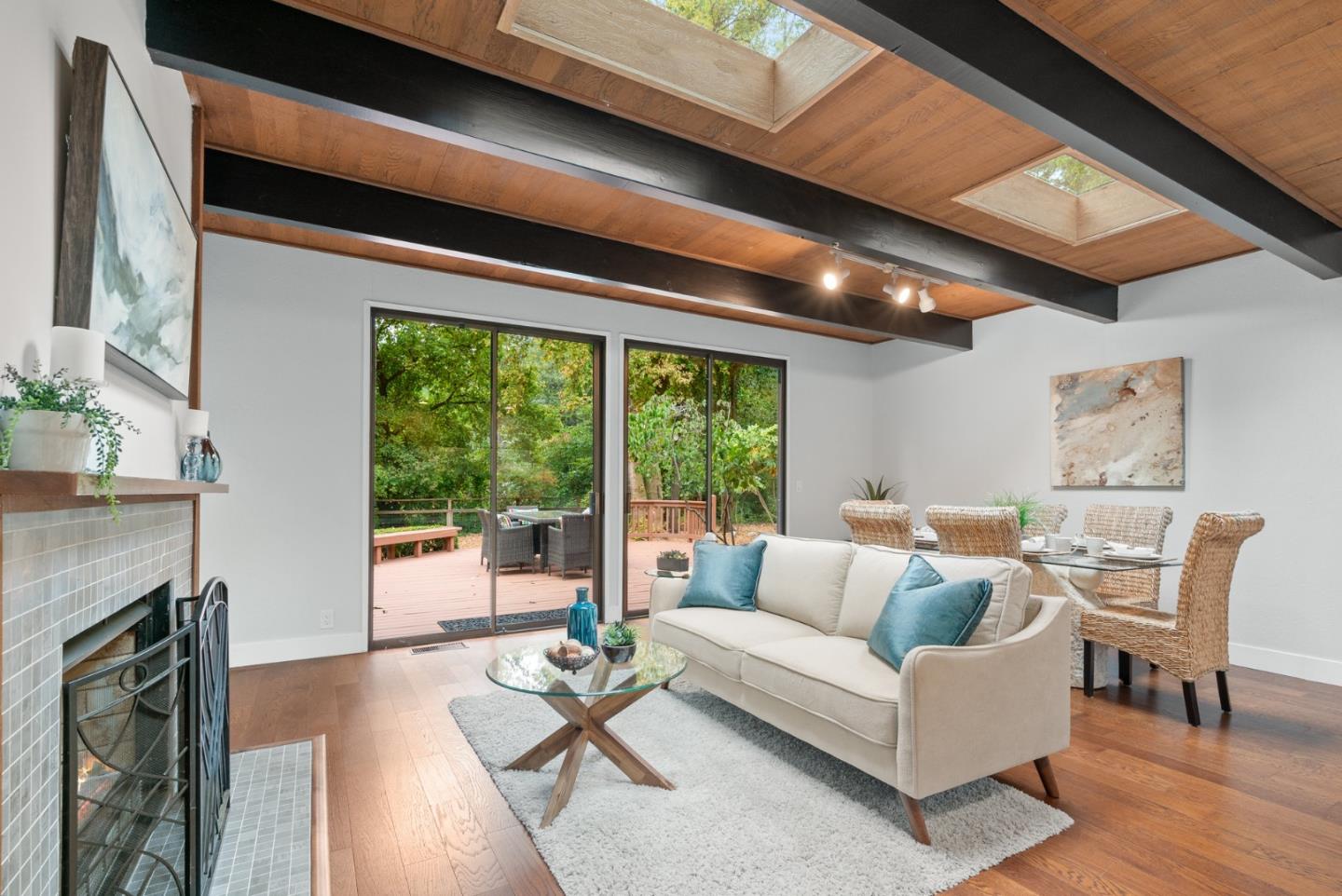 382 Riverside Avenue Ben Lomond, CA 95005 - Photo 18 of 85 a living room with furniture and a flat screen tv
