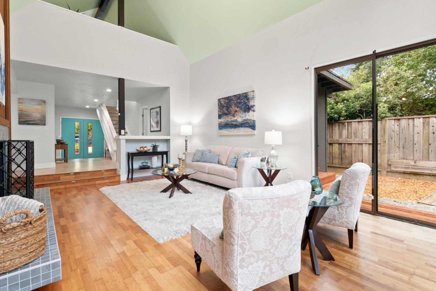 382 Riverside Avenue Ben Lomond, CA 95005 - Photo 23 of 85 a living room with fireplace furniture and a large window