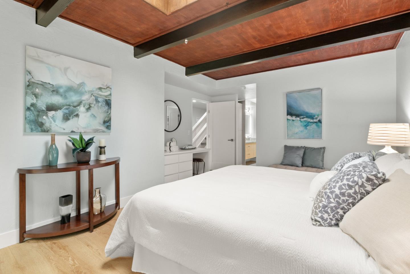 382 Riverside Avenue Ben Lomond, CA 95005 - Photo 29 of 85 a bedroom with a bed and a painting on the wall