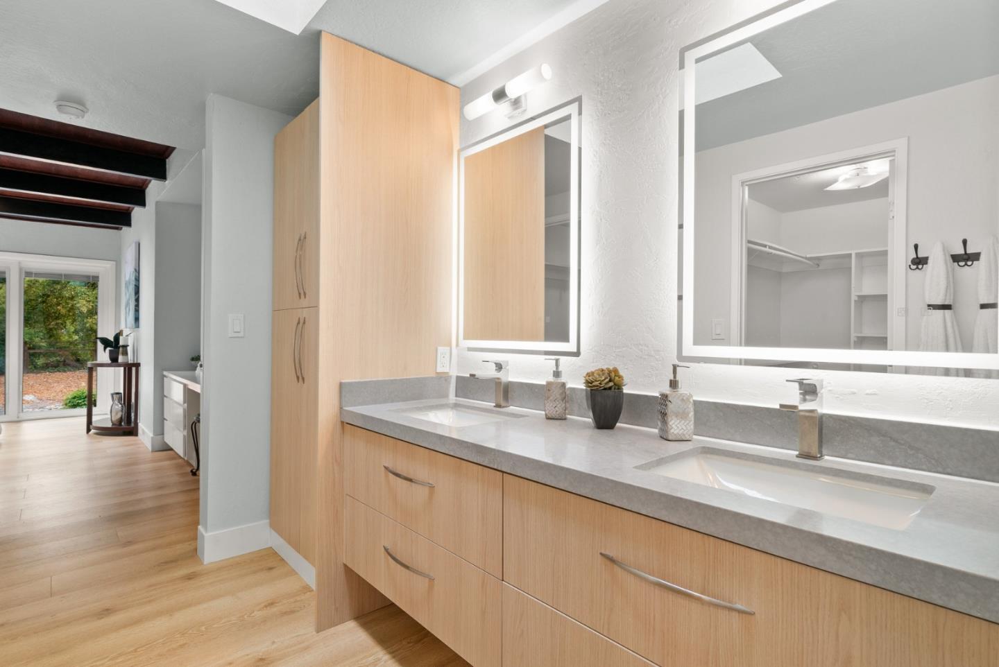 382 Riverside Avenue Ben Lomond, CA 95005 - Photo 30 of 85 a bathroom with double vanity sinks and a mirror