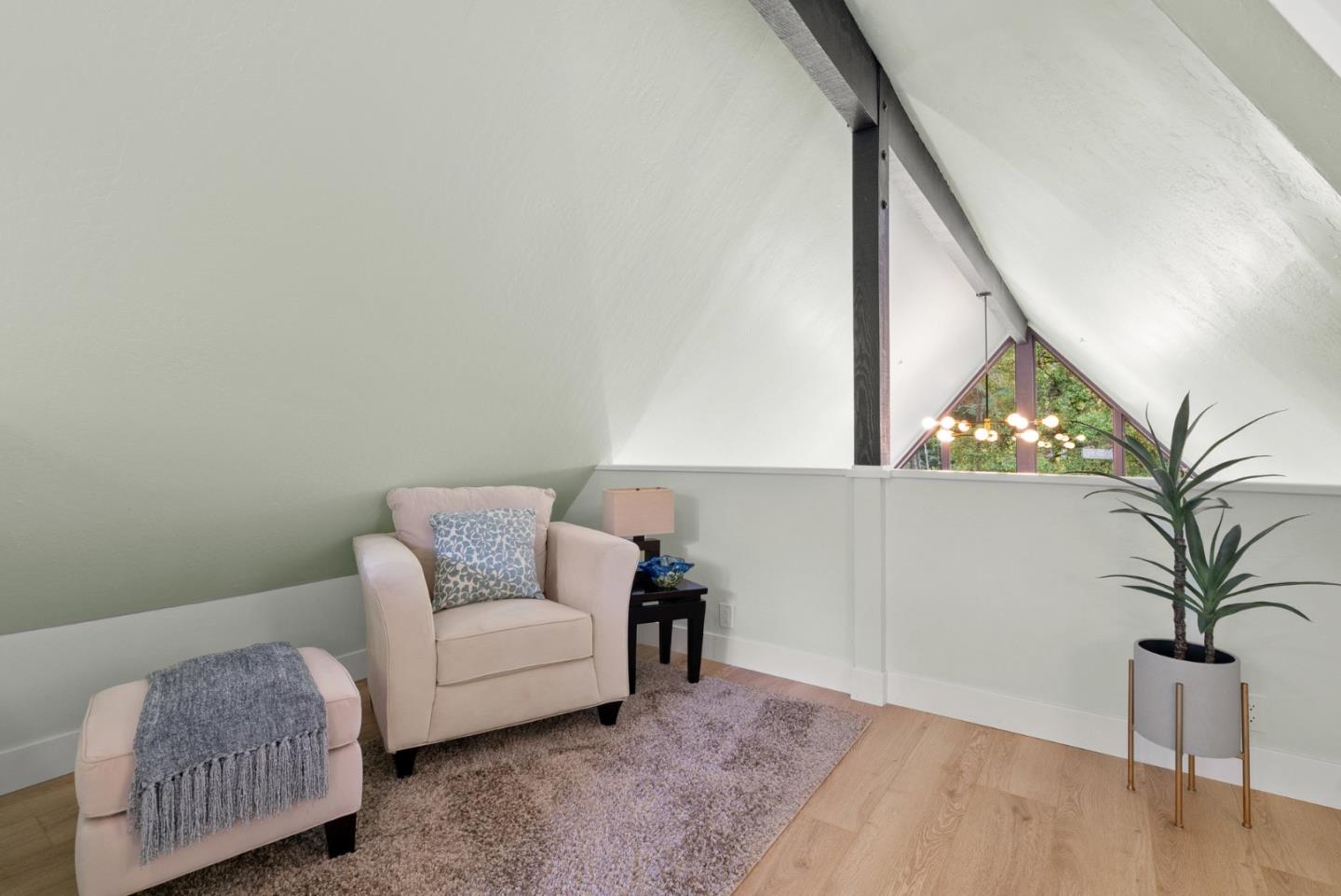 382 Riverside Avenue Ben Lomond, CA 95005 - Photo 42 of 85 a living room with furniture and a potted plant