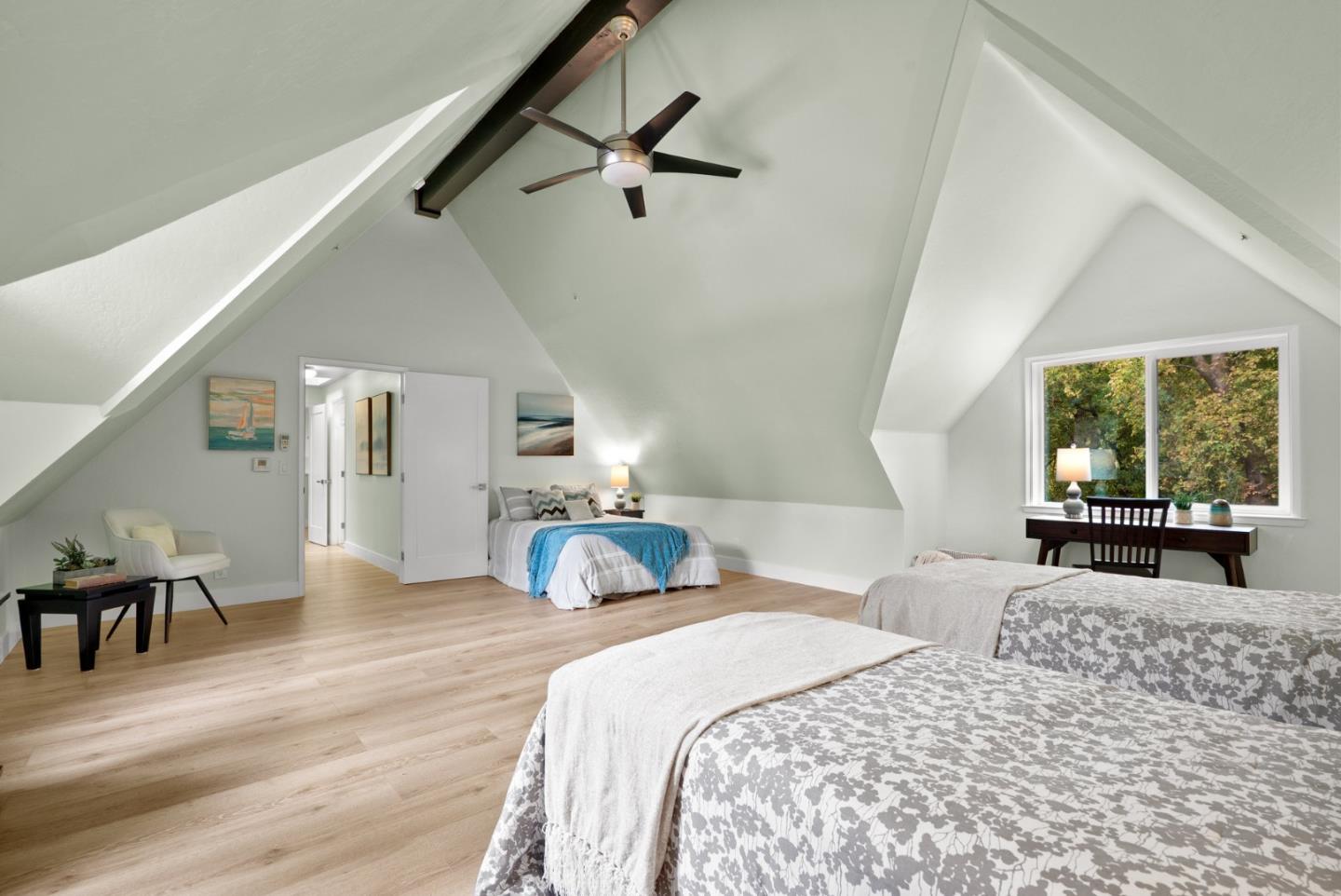 382 Riverside Avenue Ben Lomond, CA 95005 - Photo 47 of 85 a bedroom with a bed and wooden floor