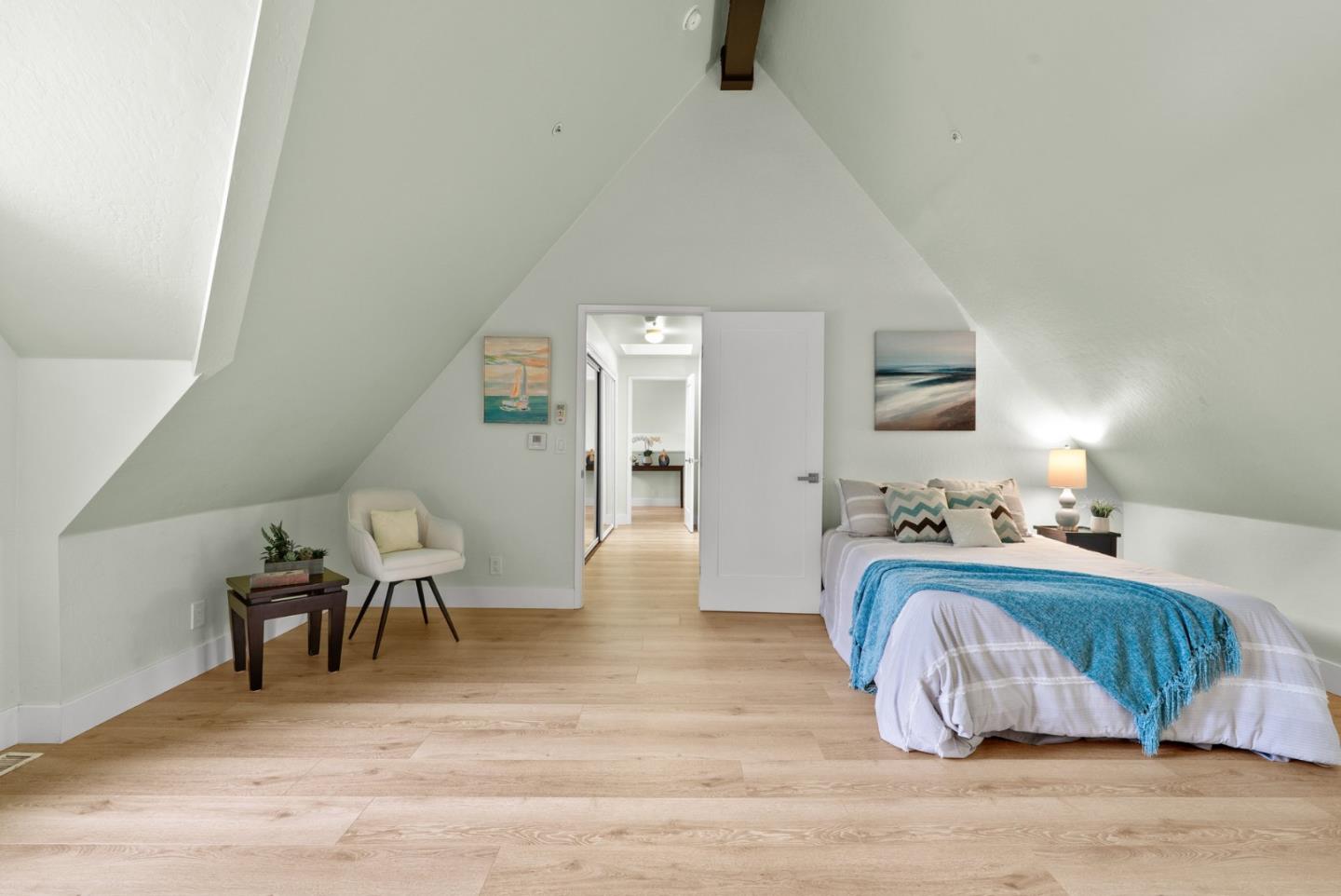 382 Riverside Avenue Ben Lomond, CA 95005 - Photo 50 of 85 a bedroom with furniture and a wooden floor