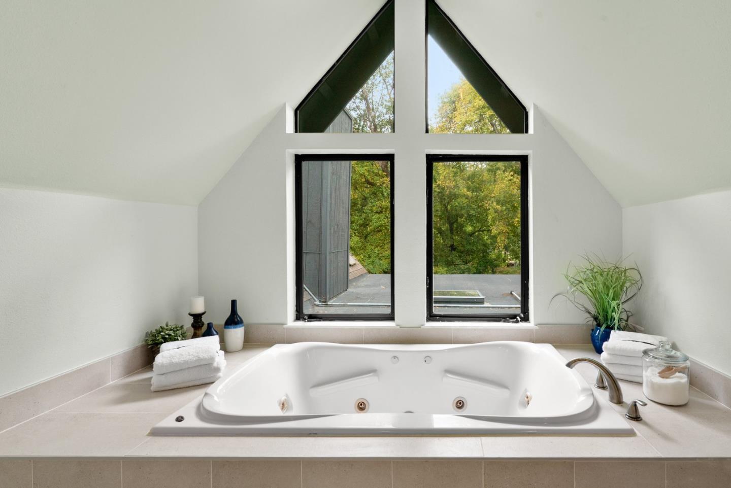 382 Riverside Avenue Ben Lomond, CA 95005 - Photo 51 of 85 a bathroom with a bathtub and a window
