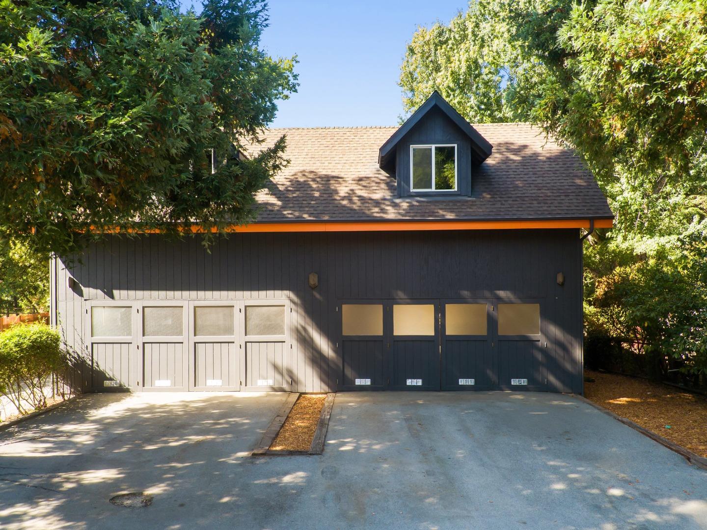 382 Riverside Avenue Ben Lomond, CA 95005 - Photo 56 of 85 a view of backyard of a house with large tree and wooden fence