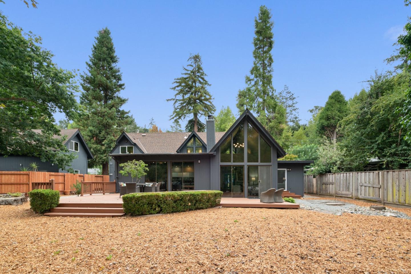 382 Riverside Avenue Ben Lomond, CA 95005 - Photo 63 of 85 a view of a house with a patio and a yard