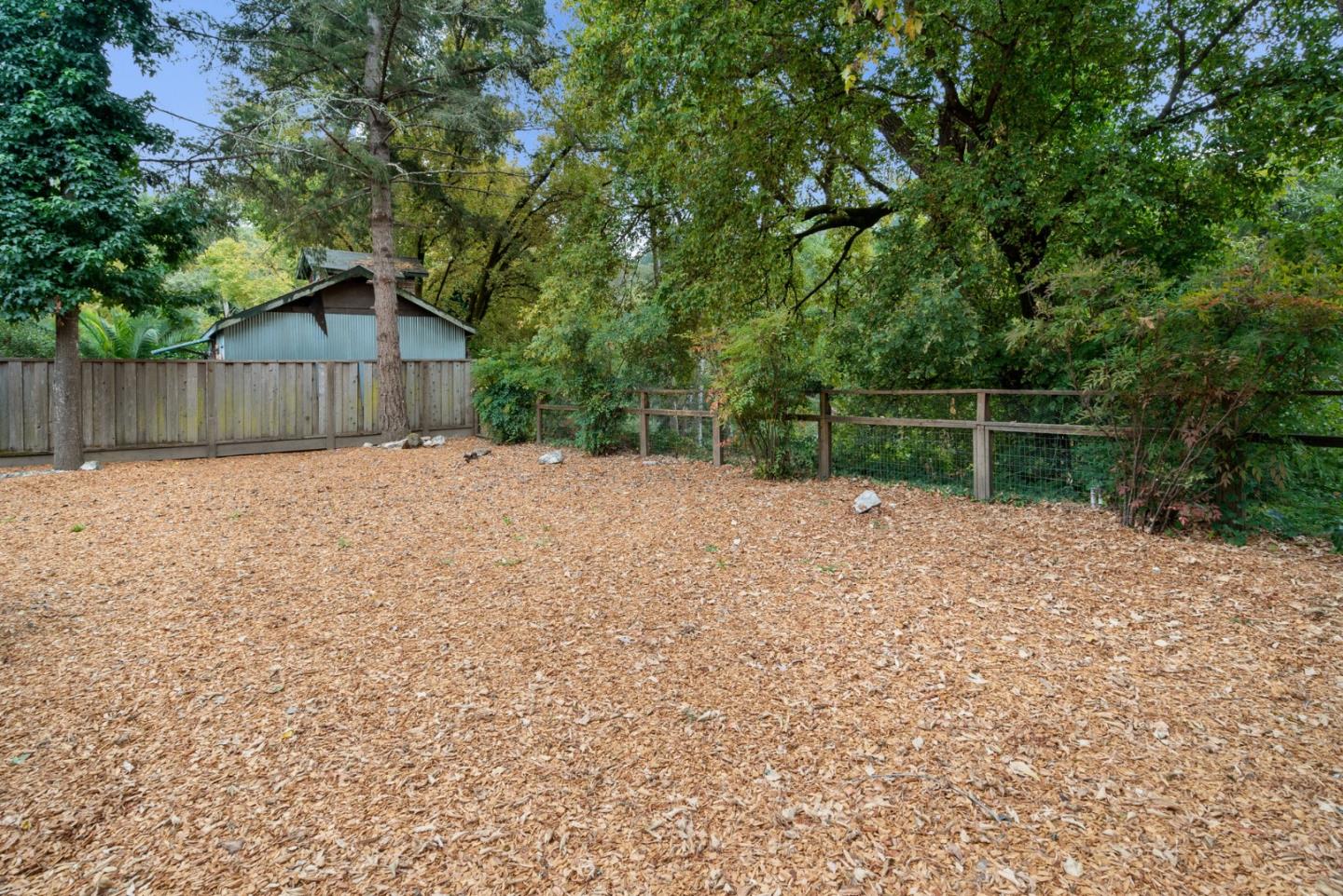 382 Riverside Avenue Ben Lomond, CA 95005 - Photo 69 of 85 a backyard of a house with lots of green space