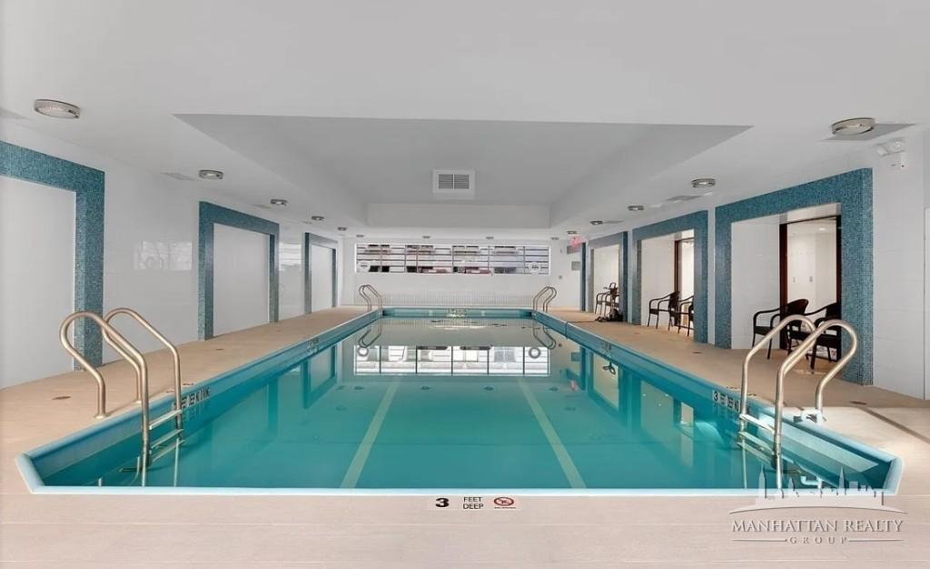 247 West 87th Street, Unit 3C Manhattan, NY 10024 - Photo 3 of 4 a living room with furniture and a flat screen tv