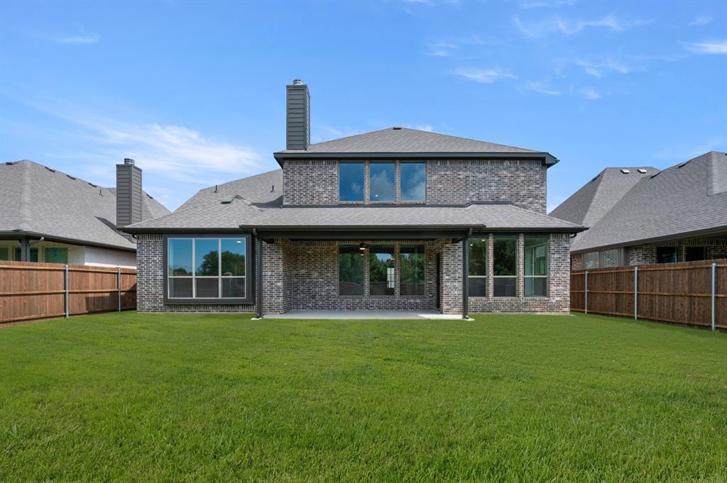 705 Seahawk Street Joshua, TX 76058 - Photo 27 of 28 DFW-Mockingbird Hills-Concept 3473-705 Seahawk Street-Rear Exterior-Risewell Homes-2