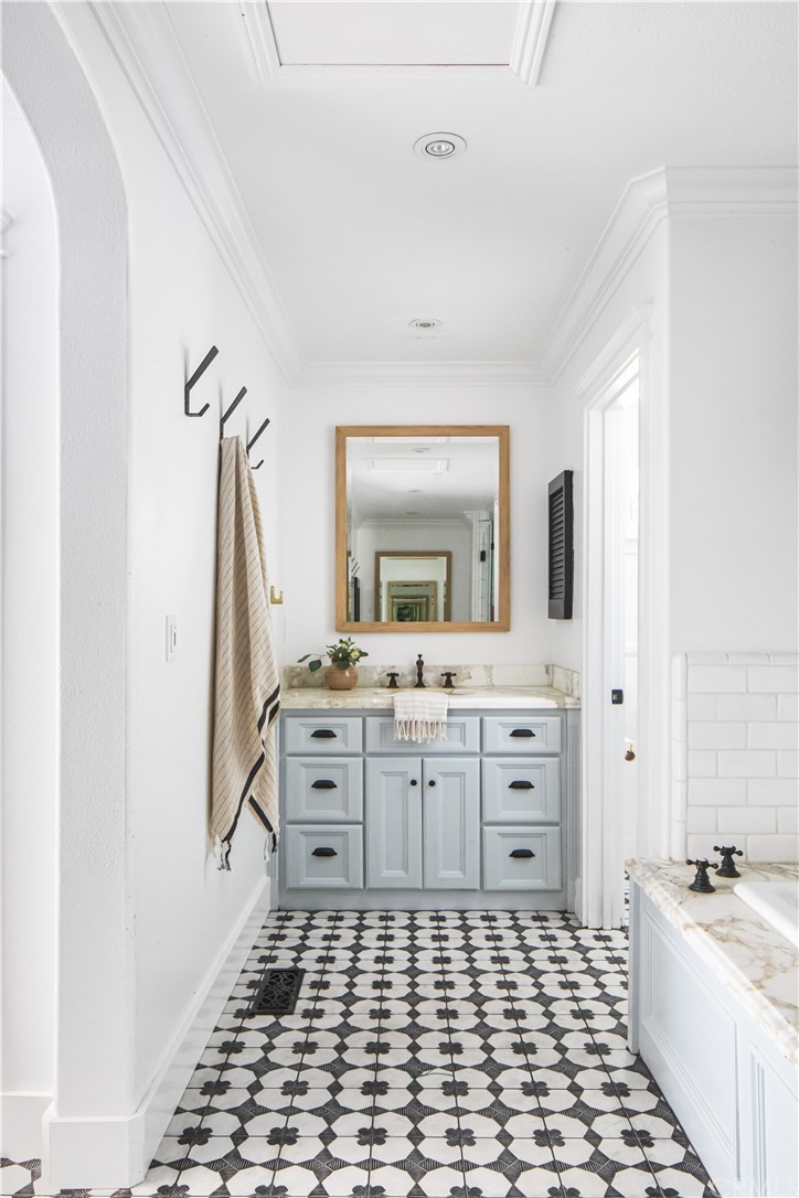 418 Broadway Costa Mesa, CA 92627 - Photo 14 of 27 a room with a sink and a mirror