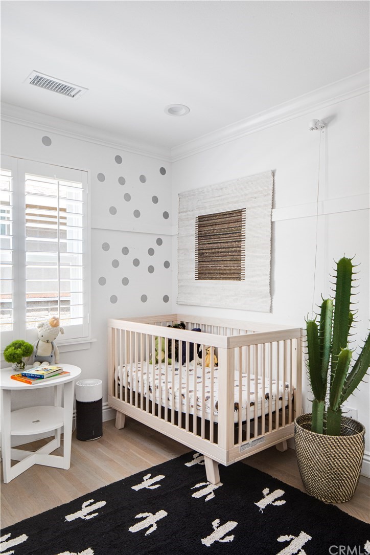 418 Broadway Costa Mesa, CA 92627 - Photo 15 of 27 a bedroom with furniture and a window