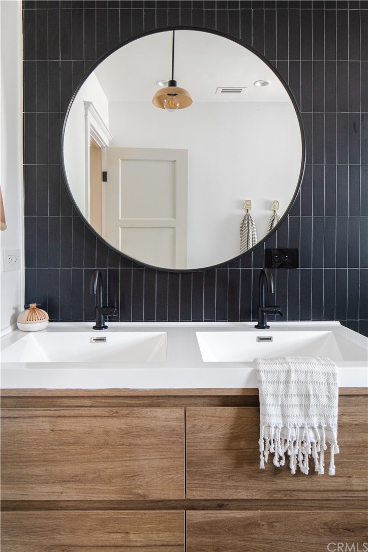 418 Broadway Costa Mesa, CA 92627 - Photo 18 of 27 a view of kitchen island with cabinets