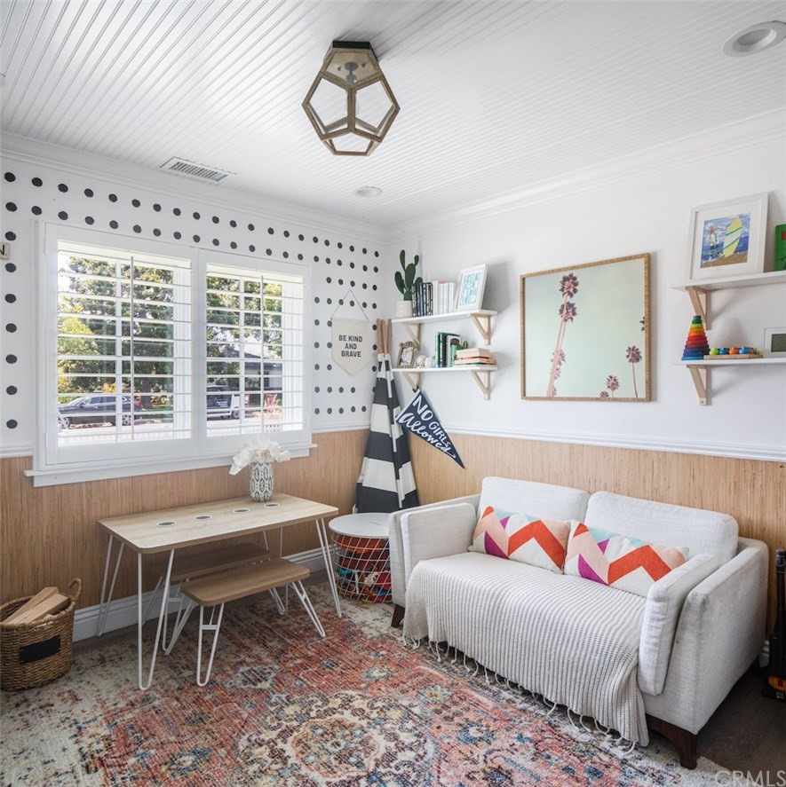418 Broadway Costa Mesa, CA 92627 - Photo 19 of 27 a living room with furniture and a large window
