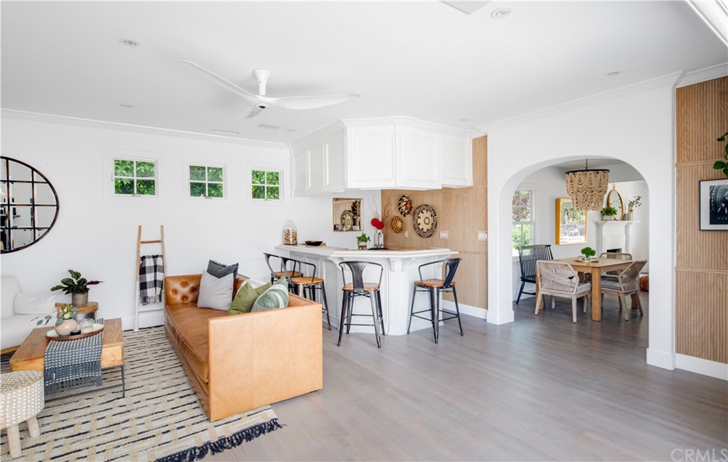 418 Broadway Costa Mesa, CA 92627 - Photo 20 of 27 a living room with furniture and wooden floor