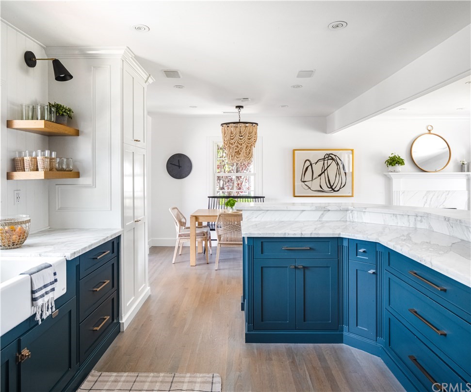 418 Broadway Costa Mesa, CA 92627 - Photo 7 of 27 a view of kitchen with wooden floor