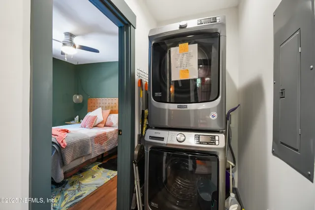 a view of a house with a yard and plants