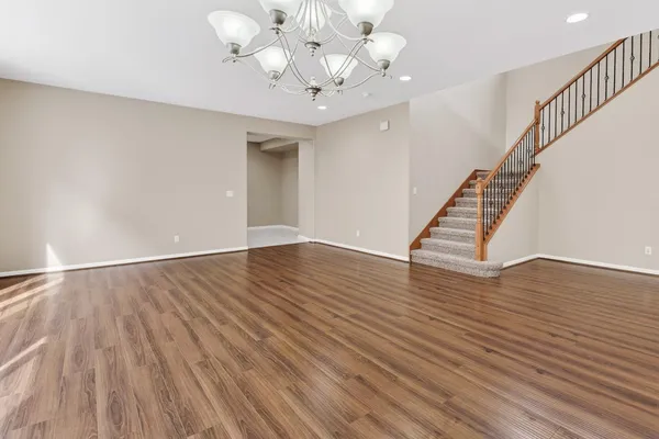 a view of entryway with wooden floor