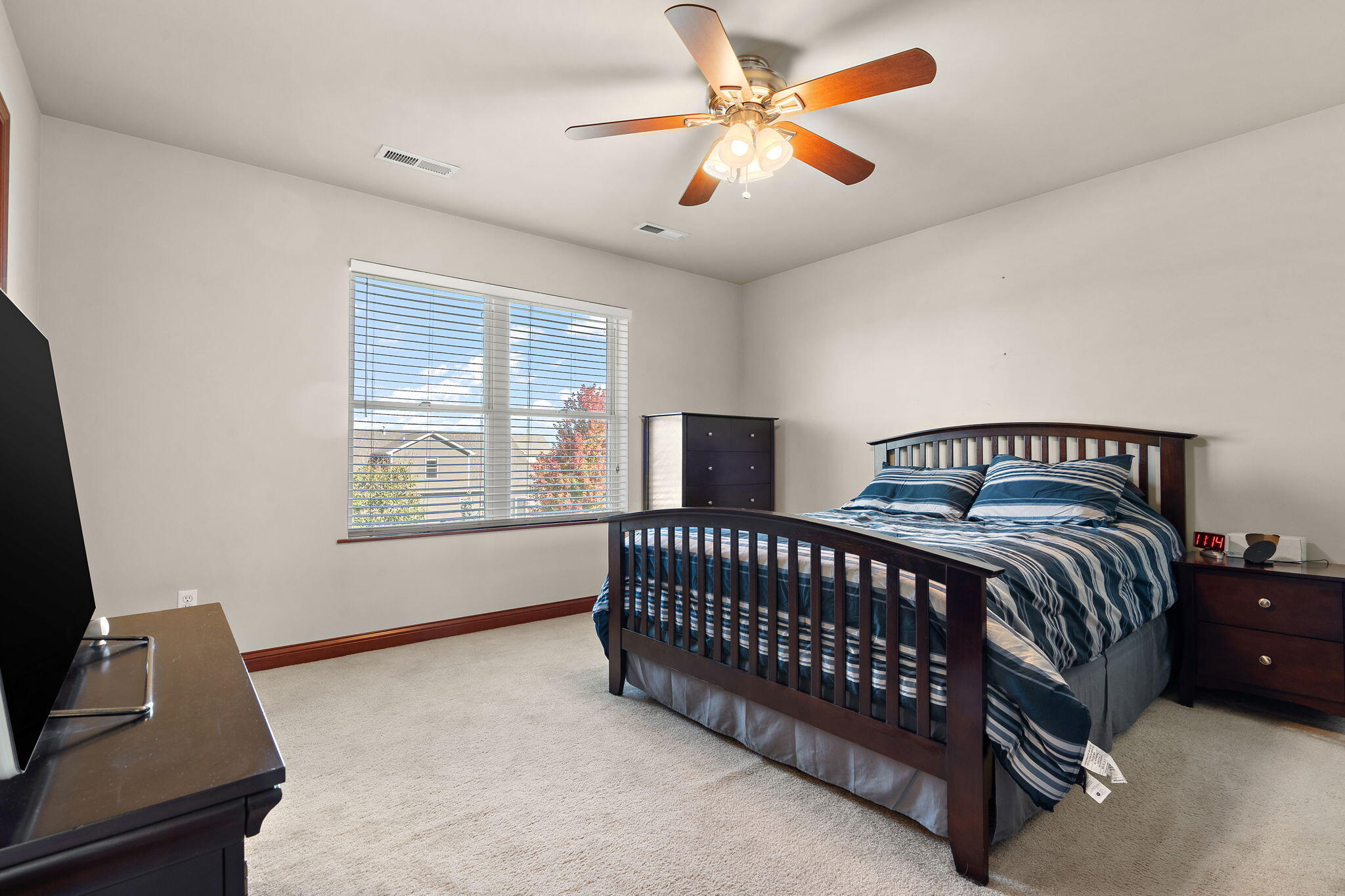 1156 Donegal Lane Crown Point, IN 46307 - Photo 14 of 25 a bedroom with a bed and a window