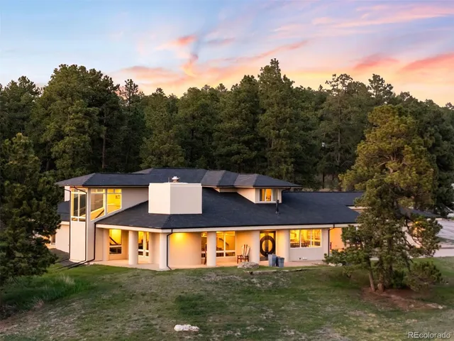 a view of swimming pool with a yard