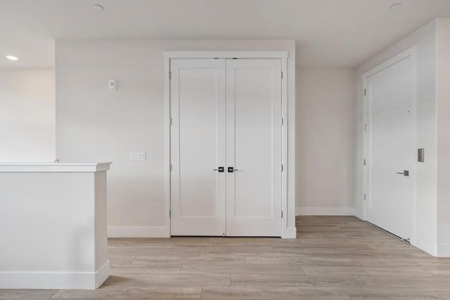 a view of a storage & utility room with washer and dryer
