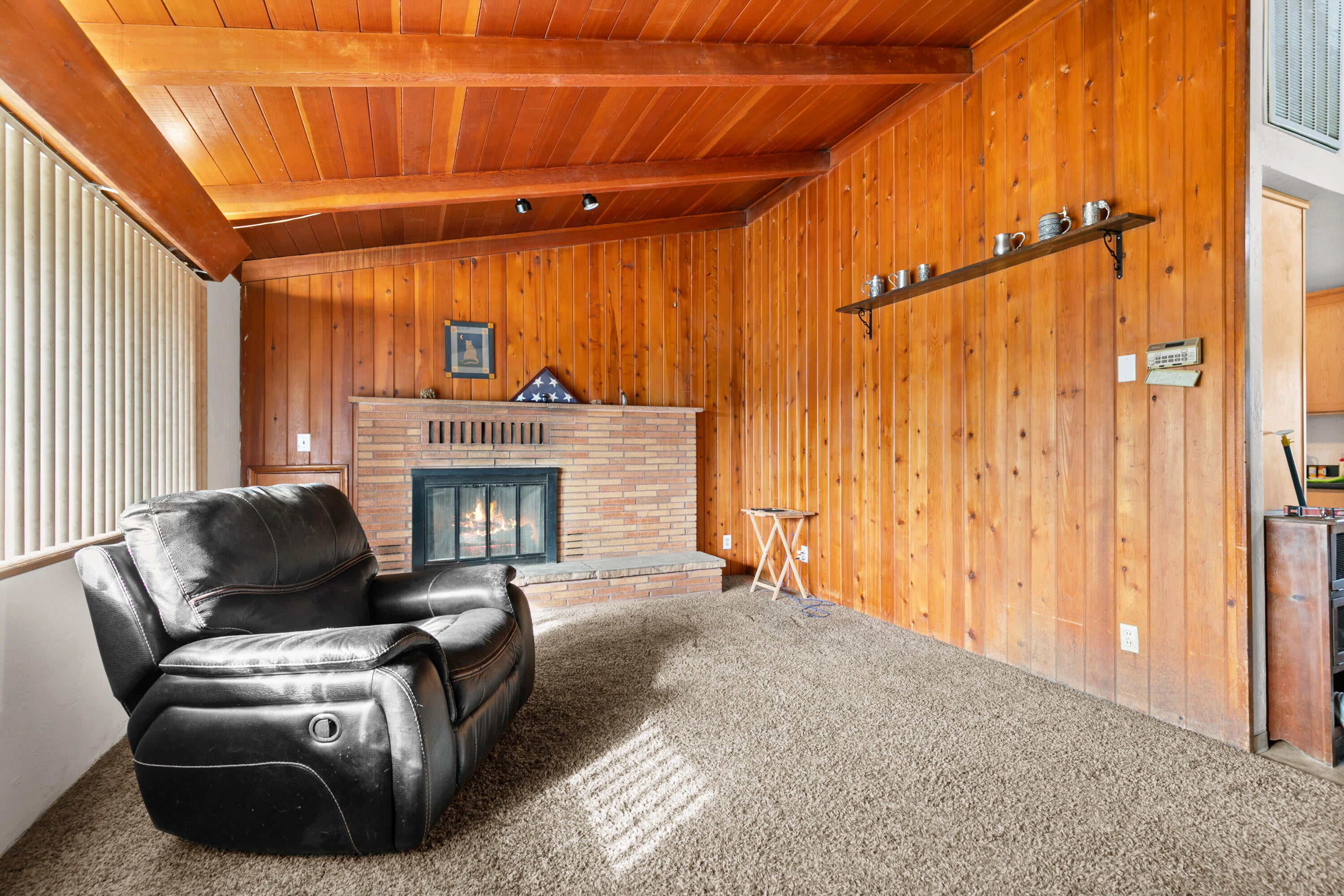348 North 6th Street Central Point, OR 97502 - Photo 2 of 24 Living room features stunning fireplace with mantle