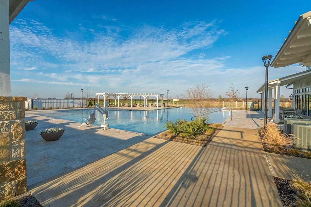 1709 Shetland Road Aubrey, TX 76227 - Photo 35 of 35 a view of swimming pool with a lounge chair