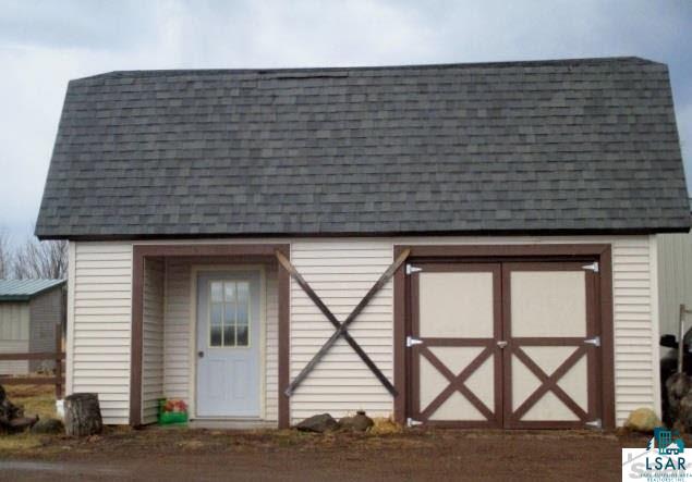 24045 Meliska Road Ashland, WI 54806 - Photo 22 of 25 One car garage with abundance storage
