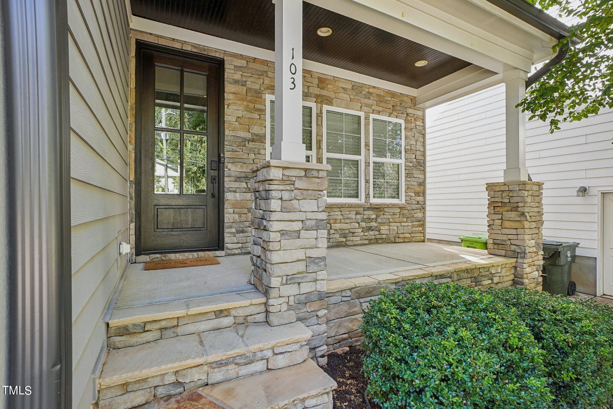 103 Pineland Circle Raleigh, NC 27606 - Photo 1 of 62 a front view of a house with a yard