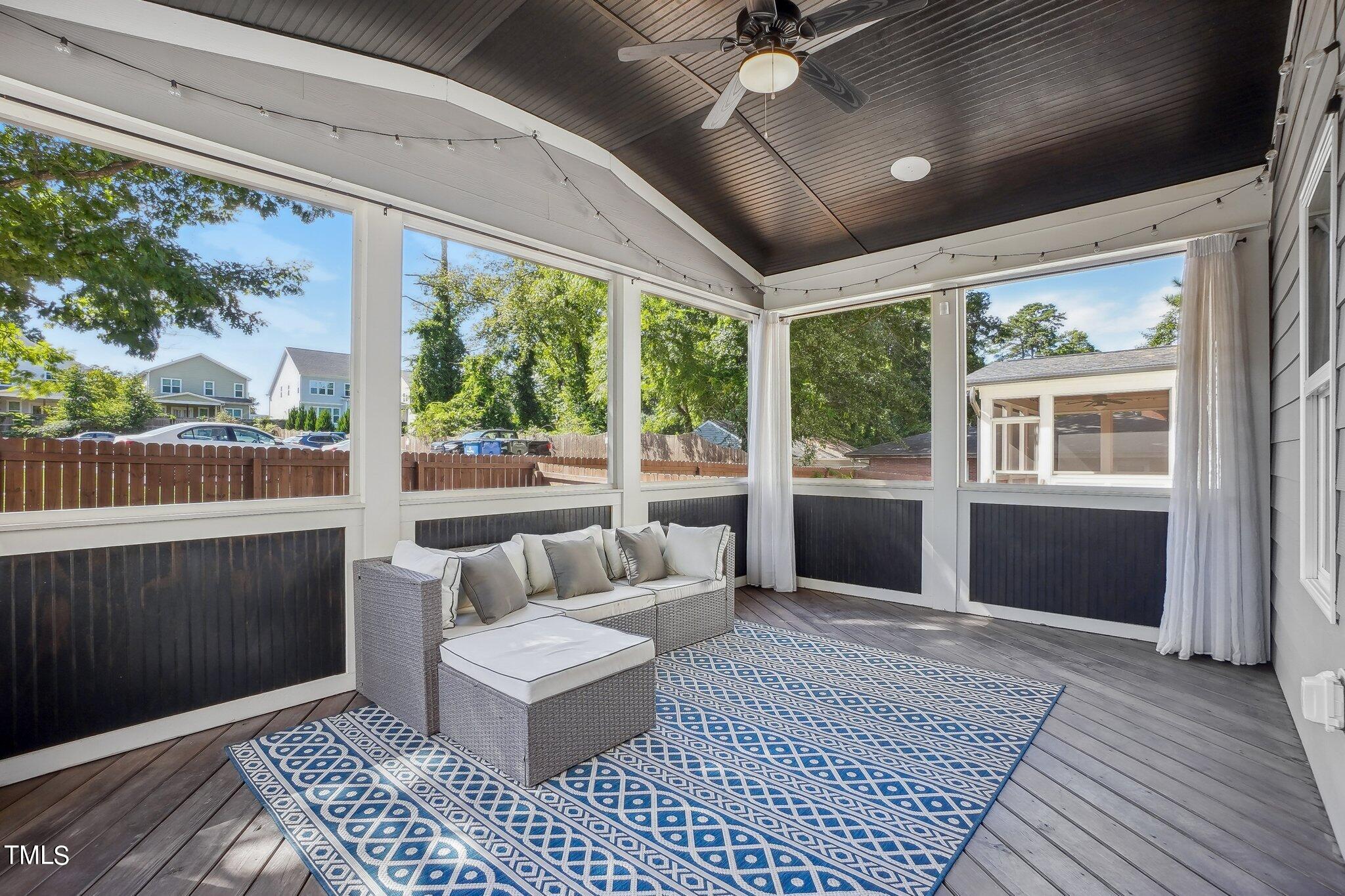103 Pineland Circle Raleigh, NC 27606 - Photo 39 of 62 a balcony with furniture and a rug