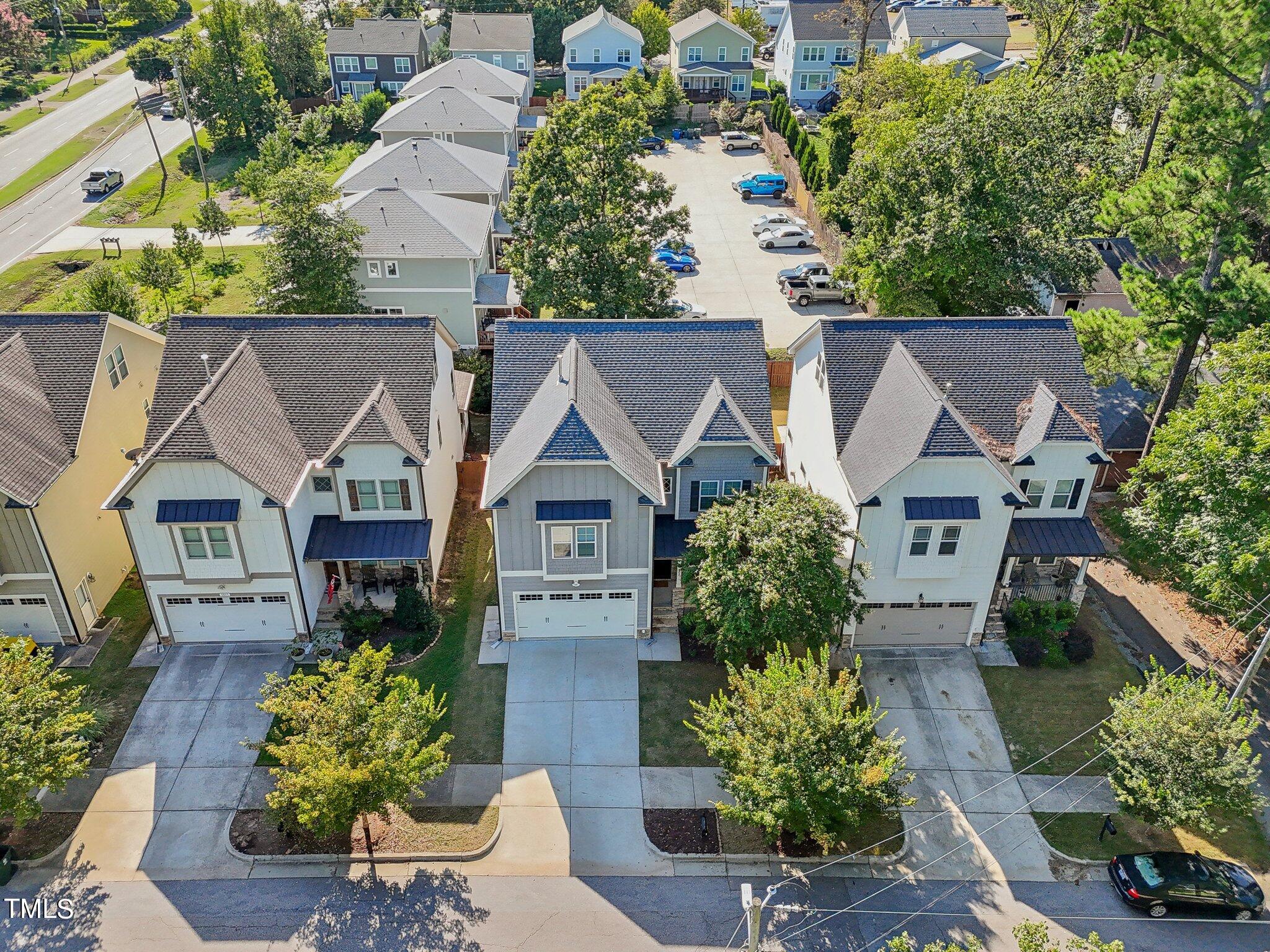 103 Pineland Circle Raleigh, NC 27606 - Photo 51 of 62 an aerial view of a house with a yard and potted plants